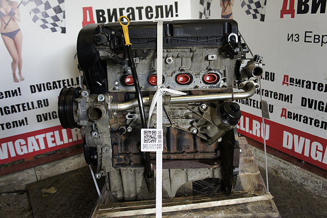 Двигатель вид с боку Chevrolet F14D4
