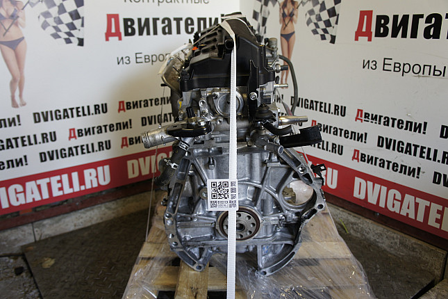 Двигатель вид с боку Honda R18A2