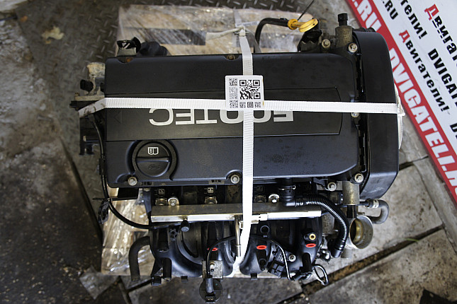 Фотография контрактного двигателя сверху Chevrolet F14D4