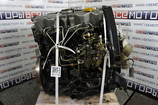 Двигатель вид с боку NISSAN LD23 