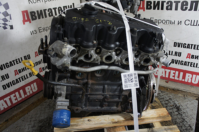 Двигатель вид с боку Hyundai G4EA