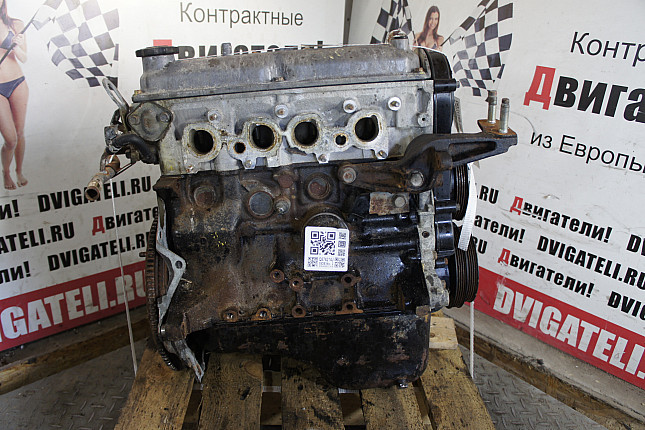 Двигатель вид с боку KIA B5