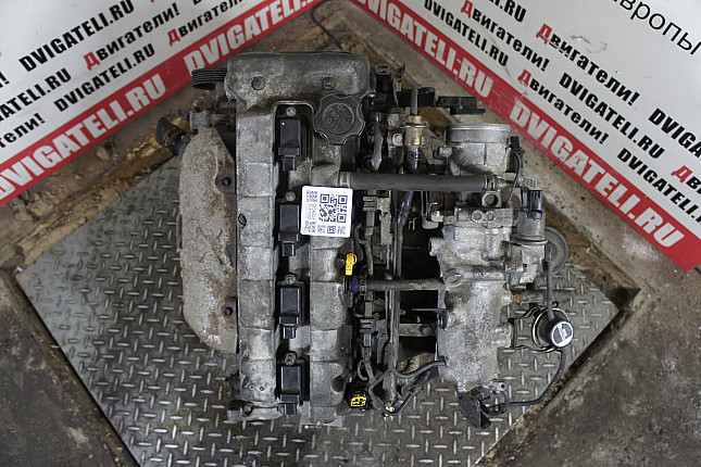 Фотография контрактного двигателя сверху Suzuki J18A